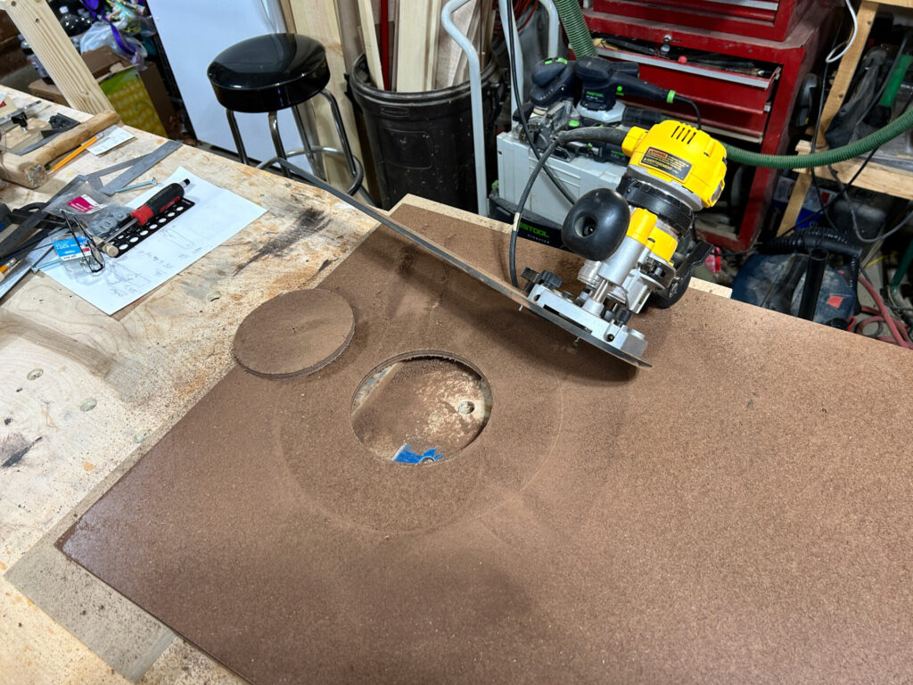 Use a router trammel to cut the hole