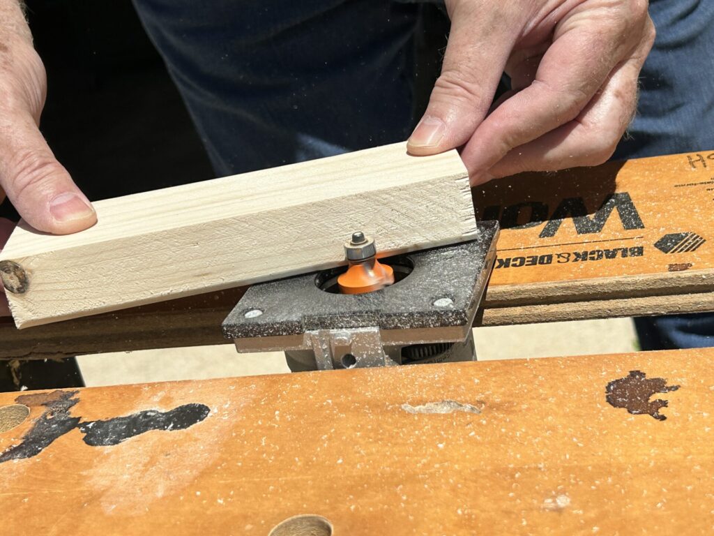 Rounding the edges of a Jenga block with a trim router